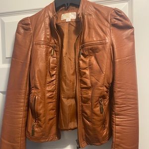 Carmel color fake leather jacket, zip up great condition super cute on